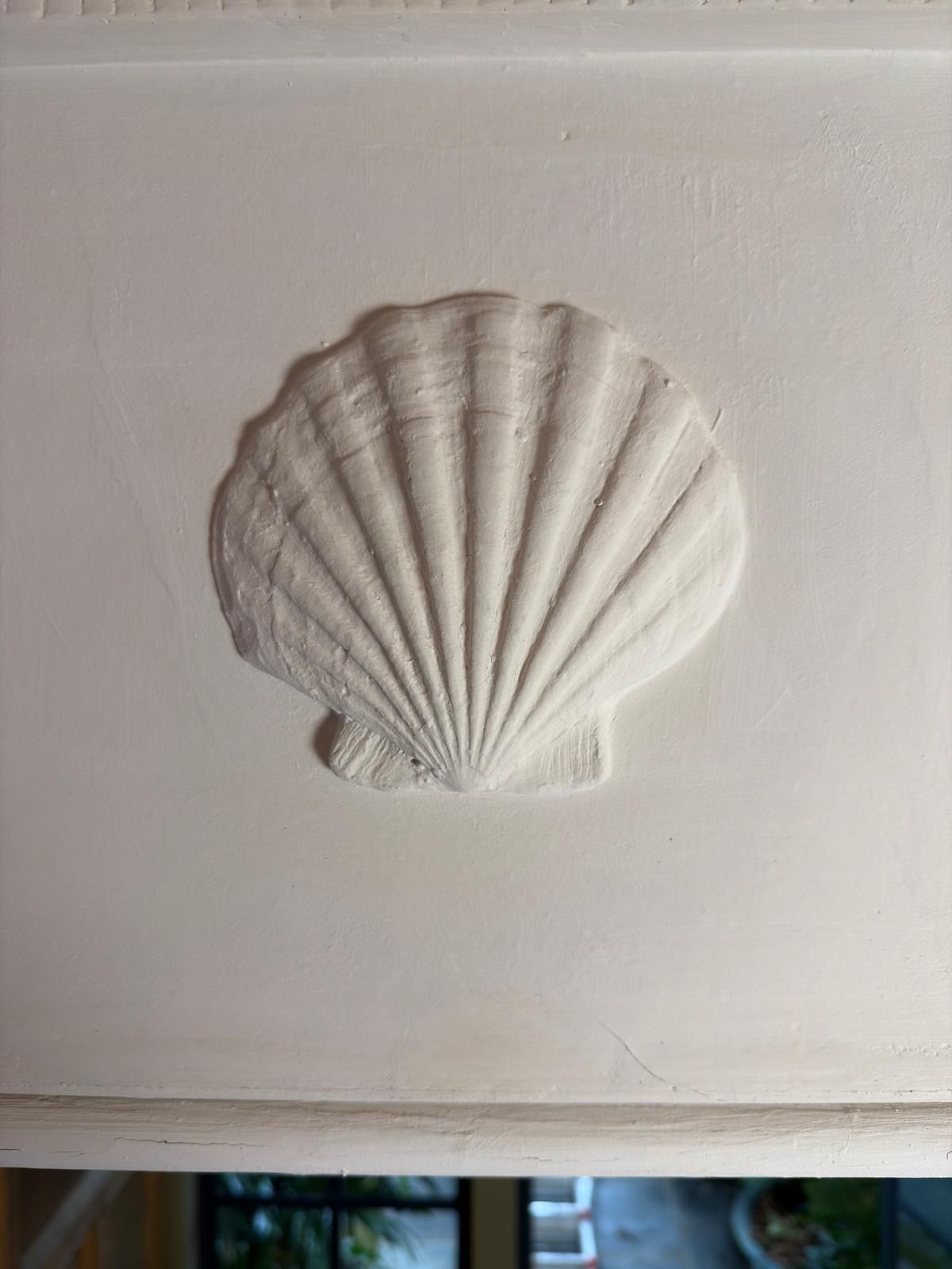 Plaster scallop shell